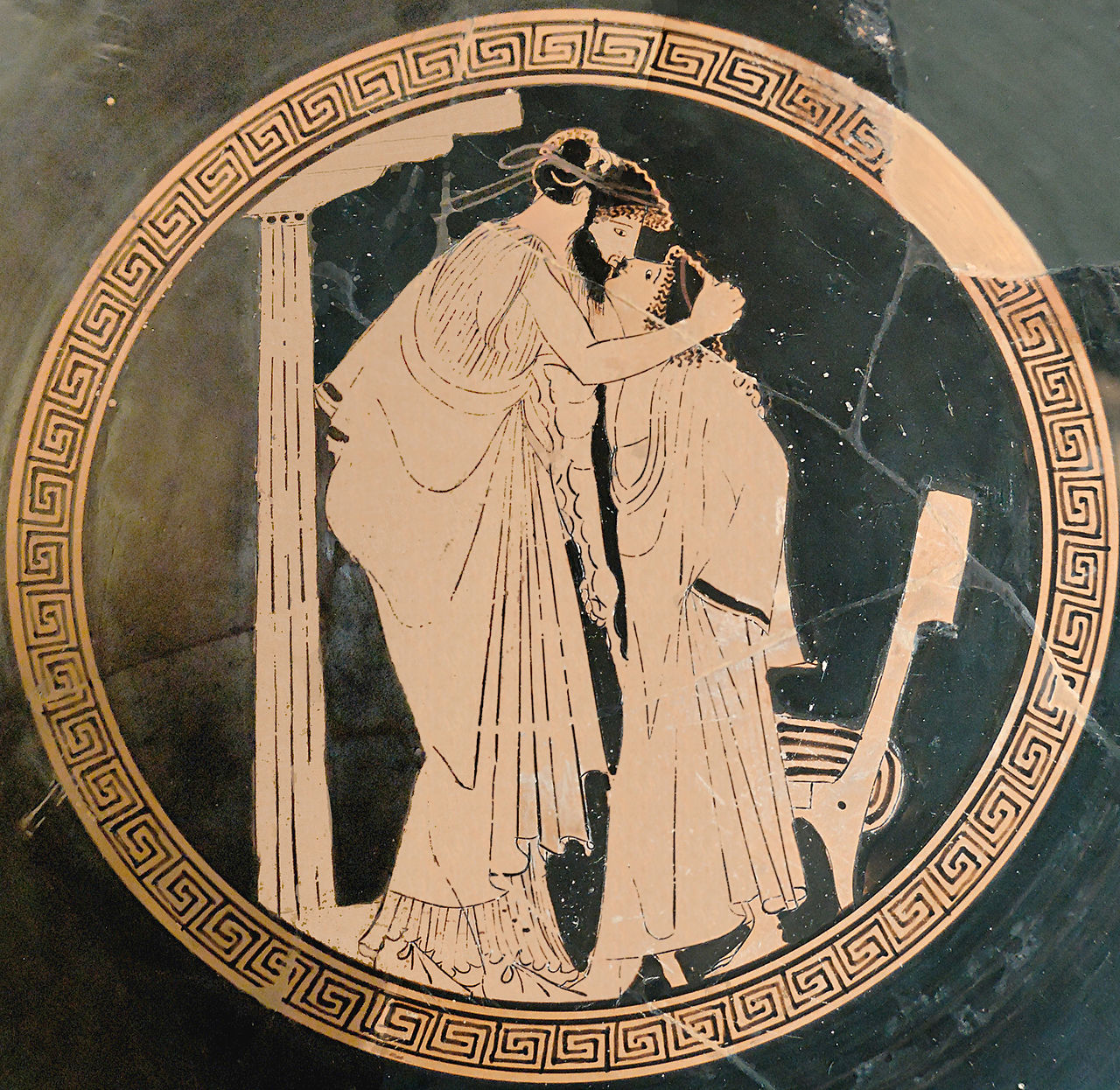 Ancient vase painting of a man kissing a boy