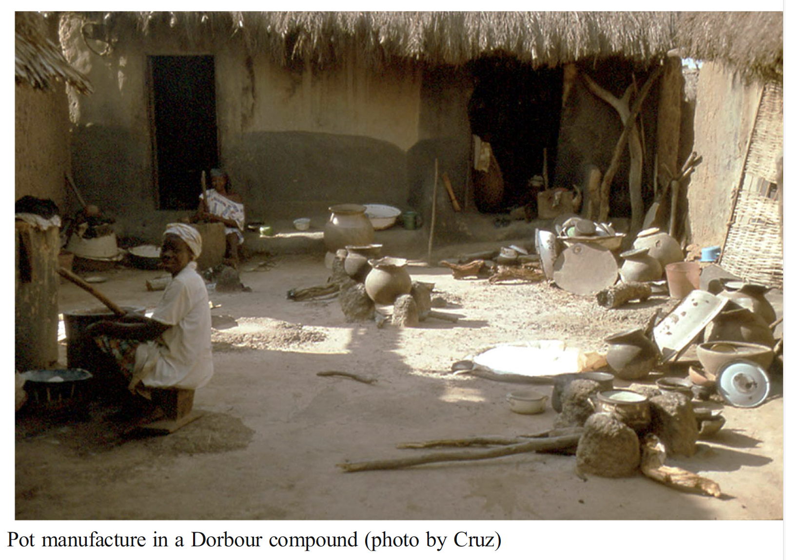 Woman manufacturing pottery